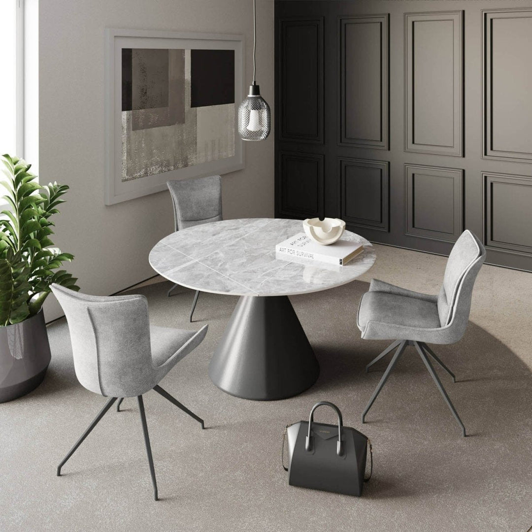 The Verona Grey Round Ceramic Extending Dining Table with 4 Chairs