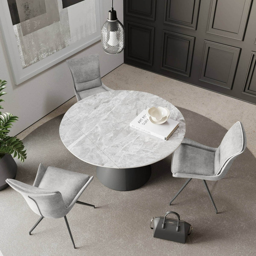 The Verona Grey Round Ceramic Extending Dining Table with 4 Chairs
